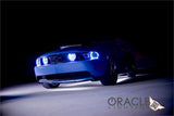 Front end of a Ford Mustang with white LED headlight halo rings installed.