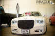 Front end of a Chrysler 300 with white LED headlight and fog light halos installed.
