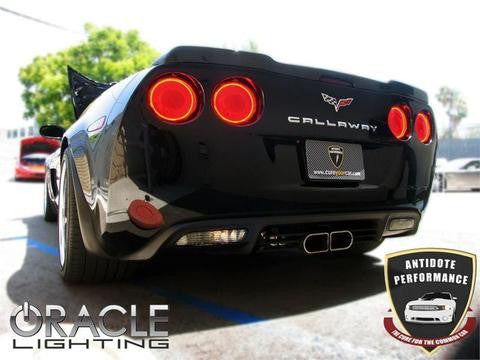Rear view of C6 Corvette with tail light halos glowing