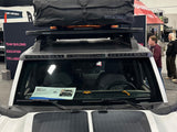 Close-up of a Integrated Windshield Roof LED Light Bar System installed on a white Ford Bronco.