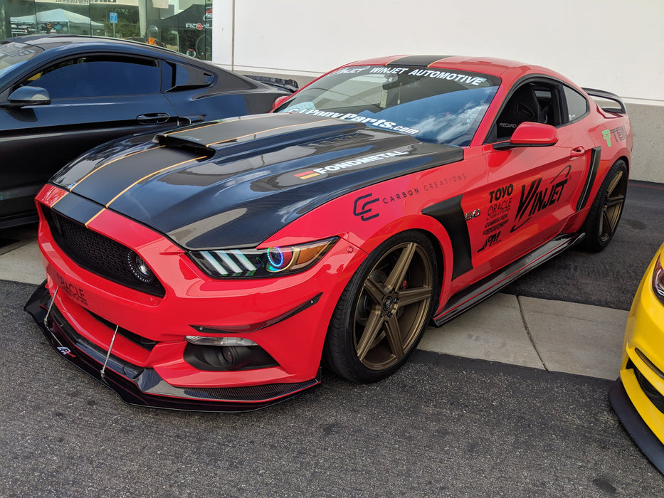 Three quarters view of a Ford Mustang with Dynamic ColorSHIFT Halos and DRLs installed.