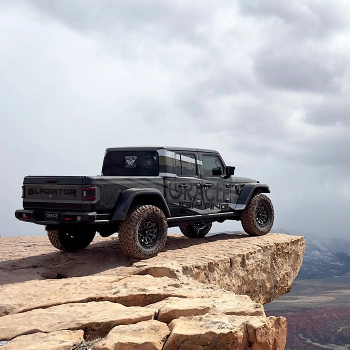 Rear three quarters view of a Jeep Gladiator JT at the edge of a cliff with Flush Mount LED Tail Lights installed.