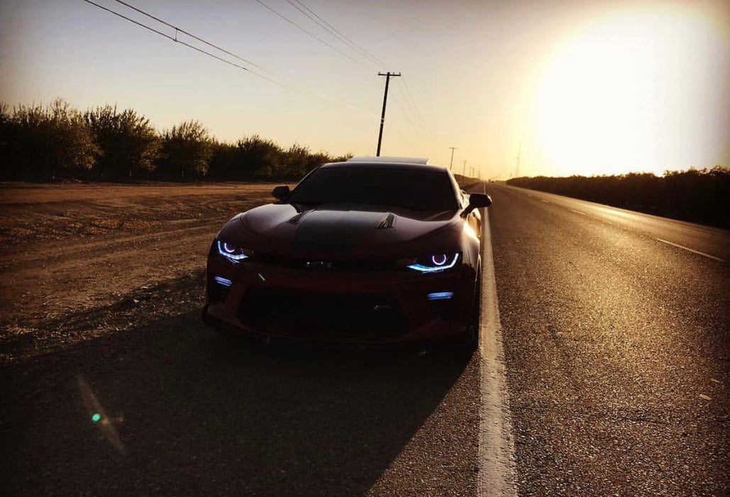 Camaro rolling with projector halos and DRL
