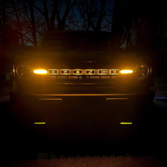 Front view of a Ford Bronco with Amber LED Illuminated Letter Badges.