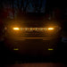 Front view of a Ford Bronco with Amber LED Illuminated Letter Badges.