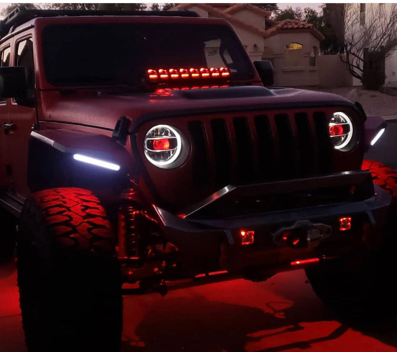 Red Jeep Wrangler JL with matching red demon eye projectors.