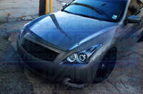 Front end of an Infiniti G37 with white LED headlight halo rings installed.