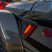 Close-up view of the Sidetrack LED Lighting System installed on a Jeep Wrangler JT, with amber LEDs on.