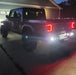 Rear three quarters view of a Jeep Gladiator with Rear Bumper LED Reverse Lights installed.