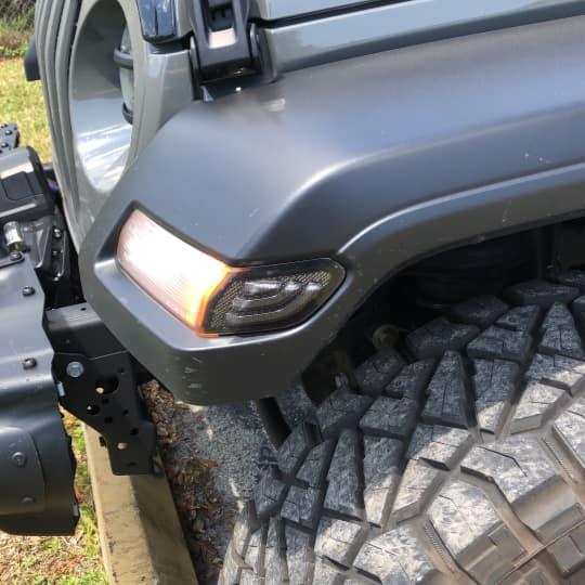 Close-up of "Smoked Lens" LED Front Sidemarkers installed on a Jeep.