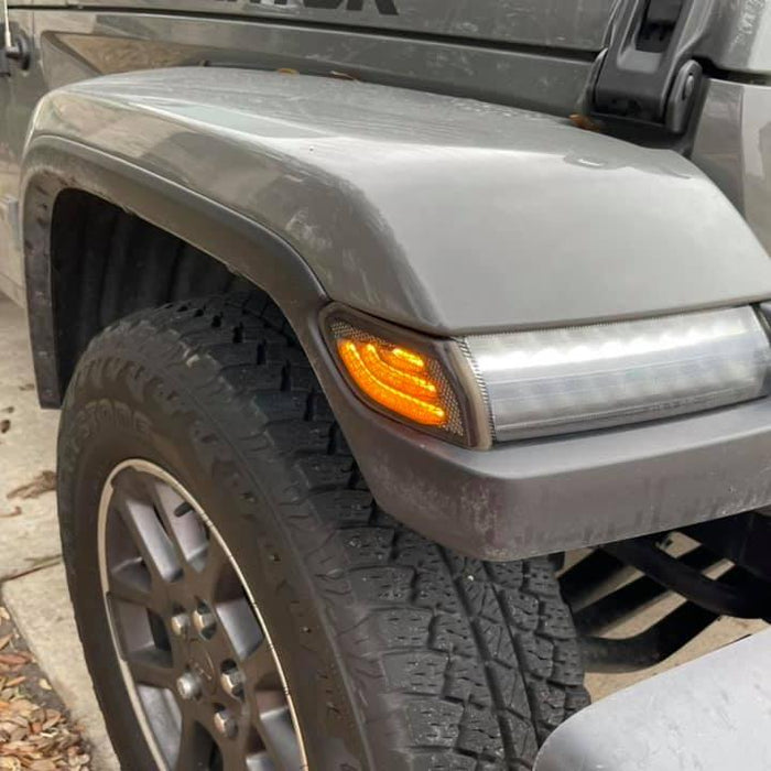 Close-up of "Smoked Lens" LED Front Sidemarkers installed on a Jeep.