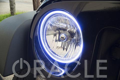 Close-up of white LED halo ring installed on a Jeep.