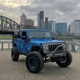 Three quarters view of a Jeep Wrangler with 7" High Powered LED Headlights installed.