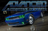 Three quarters view of a blue Dodge Challenger with green LED headlight and fog light halo rings installed.