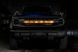 Front view of a Ford Bronco with Amber LED Illuminated Letter Badges installed.