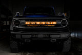 Front view of a Ford Bronco with Amber LED Illuminated Letter Badges installed.