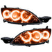 Mazda 3 headlights with amber LED halo rings.