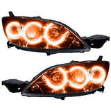 Mazda 3 headlights with amber LED halo rings.