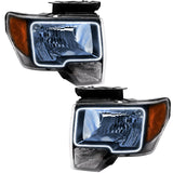 Ford F-150 headlights with white LED halo rings.