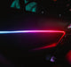 Dynamic ColorSHIFT 18-Piece Universal LED Interior Kit - Bluetooth Multi-Zone Lighting on car door with vibrant colors.