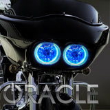 Close-up on the headlights of a Harley Road Glide, with ORACLE LED Halo Kit installed.
