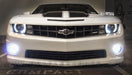 Front view of a Chevrolet Camaro with bright LED fog light bulbs installed.