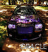 Front end of a Chrysler 300C with white LED headlight and fog light halo rings installed.