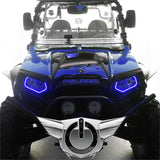 Front view of a Polaris RZR with blue headlight halos installed.