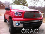 Three quarters view of a Toyota Tundra with white LED headlight halo rings.