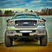 Front end of a Ford F-150 with multiple ORACLE Lighting products installed, including LED Off-Road Side Mirrors.