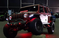 Red jeep with red demon eye projectors