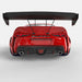 Rear view of a red Toyota Supra with Universal Illuminated LED Letter Badges installed above the license plate area.