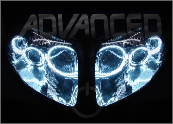 Toyota Supra headlights with white LED halo rings.