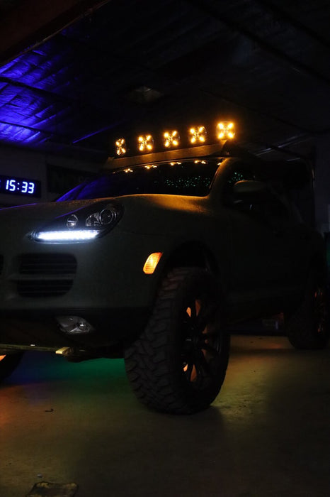 Porsche with 5 Multifunction LED Spotlights installed on the roof.