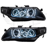 Acura TSX headlights with white LED halo rings.