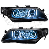 Acura TSX headlights with white LED halo rings.