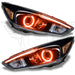Ford Focus headlights with amber halo rings.