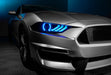 Close-up on a Ford Mustang headlight with cyan halos and DRLs.