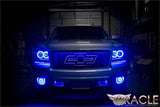 Front view of a Chevrolet Avalanche with blue LED headlight and fog light halo rings installed.