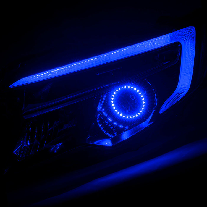Honda Ridgeline headlight with blue halo and DRL.