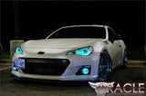 Three quarters view of a Subaru BRZ with cyan LED headlight halo rings installed.