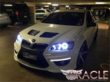 Three quarters view of a Pontiac G8 with white LED headlight halo rings installed.