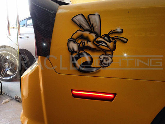Close-up of yellow charger with sidemarker on