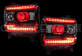 GMC Sierra headlights with red DRLs.