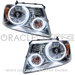 Ford F-150 headlights with white LED halo rings.