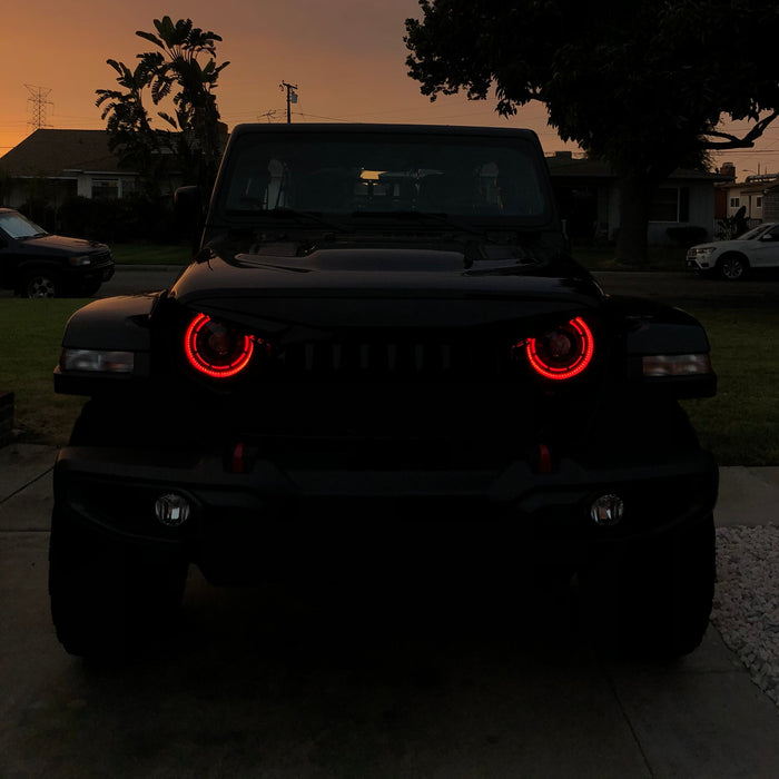 Front end of a Jeep with ColorSHIFT Oculus Headlights installed.