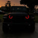 Front end of a Jeep with ColorSHIFT Oculus Headlights installed.