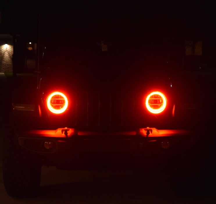 Jeep at night with red halo lights on