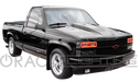 Three quarters view of a Chevrolet Tahoe with red LED headlight halos installed.