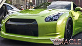 Three quarters view of a Nissan GTR with white LED headlight halo rings installed.